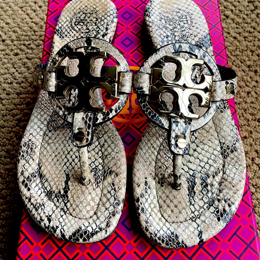 Tory Burch snake print Miller sandal with gold hardware.